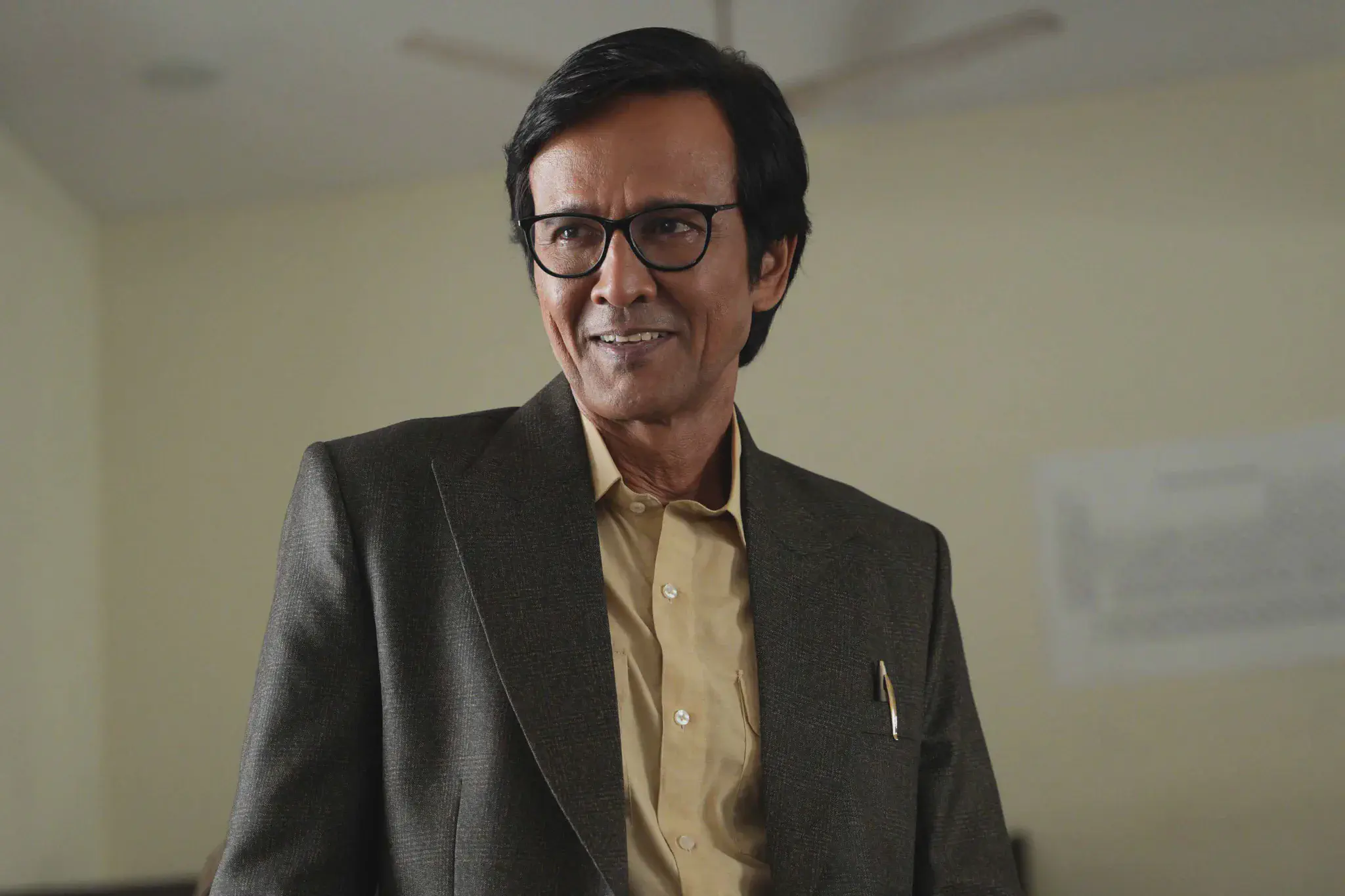 Image of scene from the film Shekhar Home